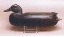 photo4delawareriver This decoy is by Charles Black. Note the barge-like shape of the body. It only realized $450 at auction in 2001 due to the condition of the paint. Photo courtesy of Guyette and Schmidt.