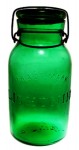 Lightning 234 A Trademark Lightning emerald green quart bottle with Putnam 328 on the base and replaced top.