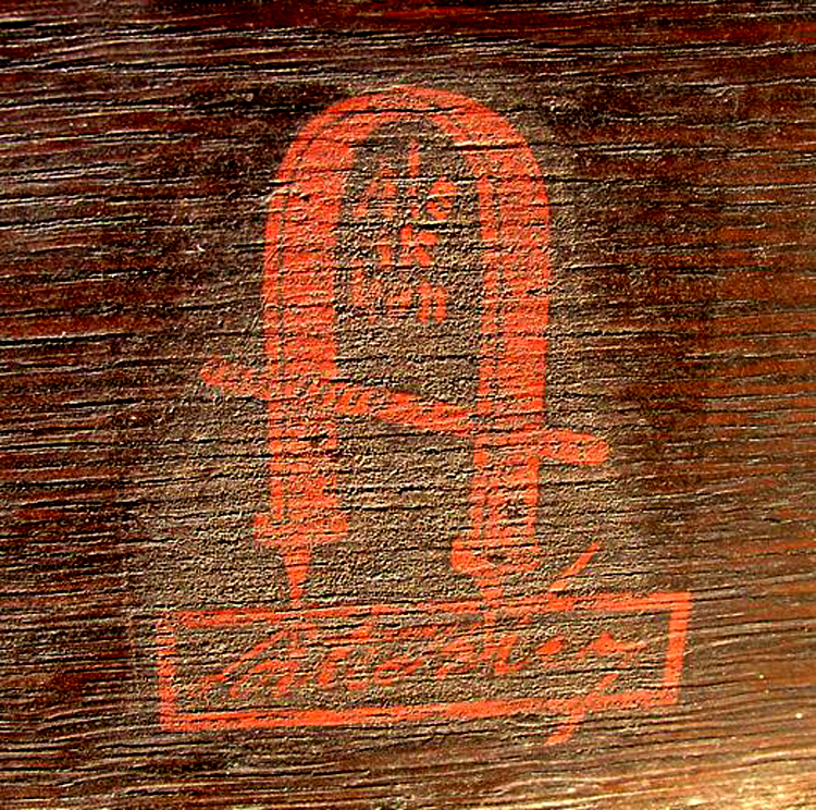 Stickley Gustav mark There is no mistaking Gustav Stickley’s unique red decal with the joiner’s compass and his trademark quote “Als ik Kan” – All I Can Do.
