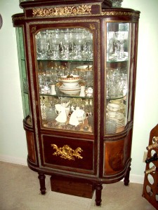 Vitrine Vitrine – This glass display cabinet with vernis martin painted side panels, French circa 1900, is called a vitrine from the Latin vitrum meaning glass or French vitre, a pane of glass.