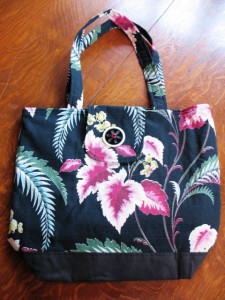 barkcloth5 Barkcloth is very popular for making bags, pillows and jackets. Vintage buttons add to this handmade tote. The tote is available in a variety of barkcloth patterns from the author at her booth in Brimfield’s Quaker Acres.