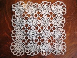 tatting5 A tatted doily in an unusual square design.