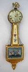 Banjo clock A gilt wood and eglomise painted glass banjo clock.