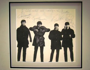 Beatles image An image of the Beatles and personally inscribed by all four to the late pianist Liberace sold for $15,800.