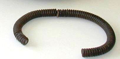 Bracelet This bracelet was made by one of the Ubangis women using bailing wire from bales of hay. Charlotte says the women made these bracelets, using their teeth to wrap the wire. To give an evaluation on a one-of-a-kind item like this is very difficult because there are no sales records to compare.