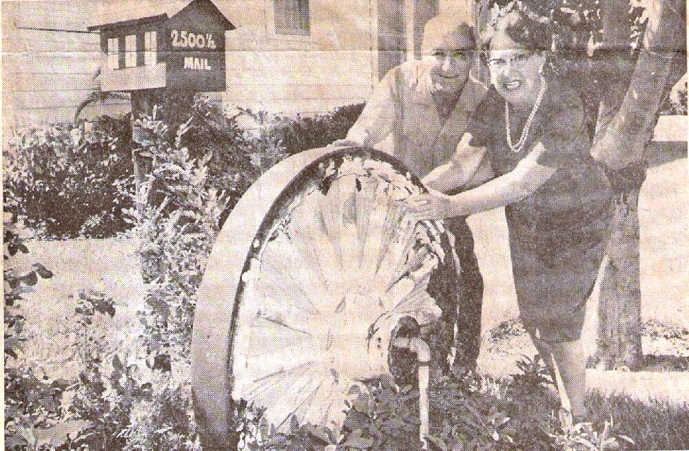 Charlotte & Bill Maxwell This photo appeared in the “Evening Independent,” a St. Petersburg newspaper. It shows Charlotte and Bill Maxwell in their yard with one of the circus wheels.