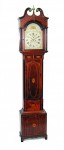 Federal tall case This Federal tall case clock in a dense and dark solid mahogany case (NY or NJ), circa 1790-1810 brought $6,900.