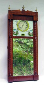 Joseph Ives A reverse painted and mirror and wood cased wall clock by Joseph Ives was the top seller of a clock and horology auction hosted by Gordon S. Converse & Co. This clock sold for $9,200.
