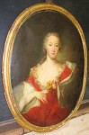Portrait of lady An oil on canvas portrait of lady in red in oval frame will be part of the Feb. 20 sale.
