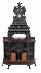 Black walnut clock This highly carved black walnut clock was made by Ferdinand Lapp.