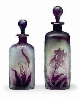 Wheel-Carved Glass Bottles with Stoppers These wheel-carved glass bottles with stoppers, circa 1910 should sell for an estimate $1,800 to $2,500.