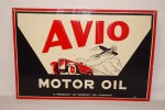 Avio Motor Oil This Avio Motor Oil (“a Product of Midwest Oil Company”) single-sided embossed tin sign sold for $5,500.