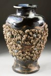 Japanese vase This rare and large Japanese Sumida Gawa masterpiece vase, made in the late 19th century, may bring between $6,000 and $9,000 at auction.