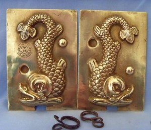 dolphin A rare 19th-century brass dolphin mold, manufactured by Charles Trottier of Paris.