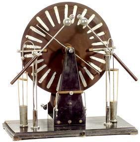 wimhurst This Wimshurst Machine is an electrostatic device for generating high voltages developed between 1880 and 1883.