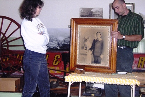 Auction Wally Walt Kolenda, better known as Auction Wally, appraises an antique print at the Readsboro, Vt. Historical Society's Antiques Appraisal event.
