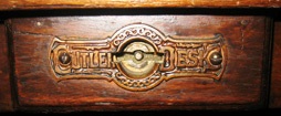 Cutler name The Cutler Desk Co. of Buffalo used this escutcheon plate for its label.