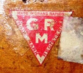 GRM This mark was used by members of the Furniture Manufacturers Association of Grand Rapids between 1899 and 1913 to identify true “Grand Rapids Made” furniture and to differentiate it from imposters of the period.