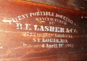 Lasher This unusual label was found on the inside of a cabinet. It is not the label of the manufacturer but the label of the maker of the machinery that made the drawer joinery in the cabinet.