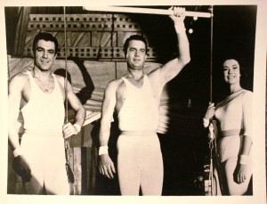 bigshow The cutline on the back of this 8 x 10 inch publicity photo says “Cliff Robertson (center) and members of the Krone circus family are aerialists in “The Big Show” on THE ABC SUNDAY NIGHT Movie. Robert Vaughn, Esther Williams and David Nelson co-star Sunday, December 24 at _______ in color on Channel _______ and the ABC Television Network.” Photos of this type are valued at $5 or less.