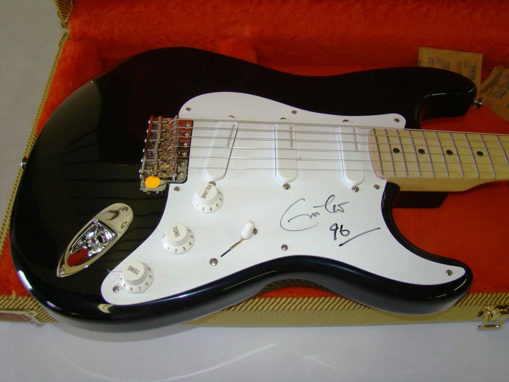 Clapton guitar Rock legend Eric Clapton's “Blackie” Fender guitar, signed, brought $2,825.