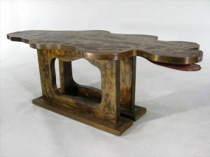 Lavern table Amorphous figural sliding coffee table by Philip and Kevin Lavern, mid 20th century ($6,300).