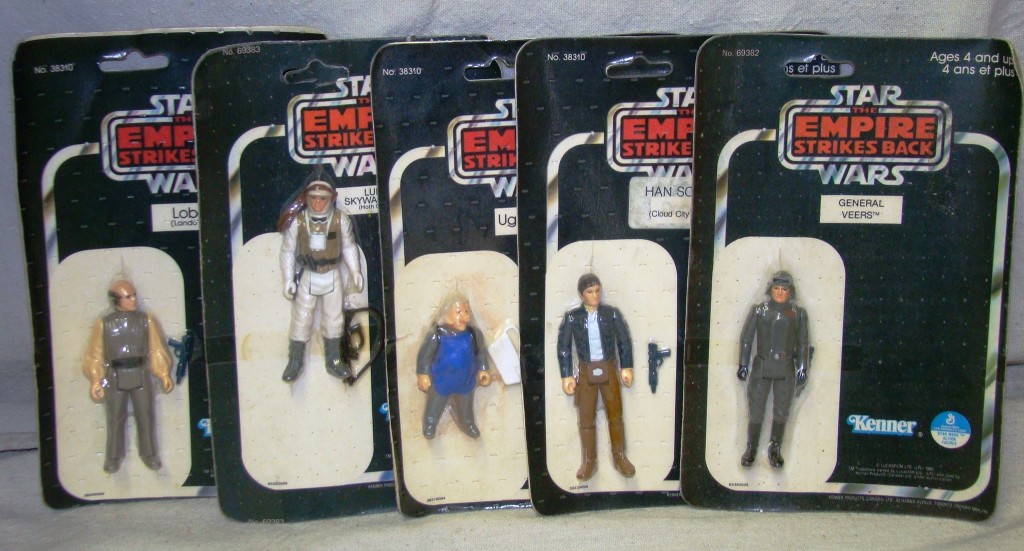 Star Wars This lot of five Star Wars action figures on cards gaveled for $5,367.50.