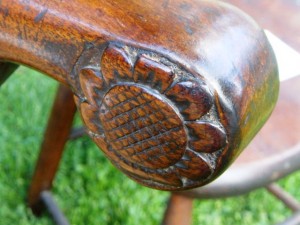 Armchair sunflower The sunflower carved into the arm of the Chippendale chair indicates a Litchfield provenance.