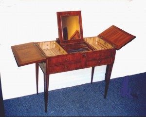Beau Brummel The name Beau Brummel is associated with the French form of the poudreuse, a style of dressing table from the 18th century.