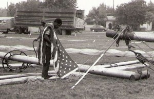 bale ring 2 A bale ring on a big top center pole. A worker is preparing and U.S. flag to mount on top of one of the big top poles. Both of these photos were taken in the 1970s on the Clyde Beatty-Cole Bros. Circus.