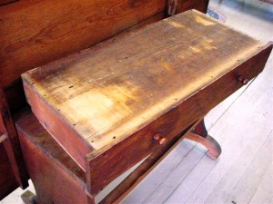 Drawer An examination of the bottom of this mid-19th-century drawer shows a lot of wear and stress on the bottom panel. That means there is a problem with the drawer slides either on the drawer itself or in the case.