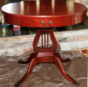 Lyre base drum table This Mersman drum table has the lyre base usually found on the “surfboard” table.