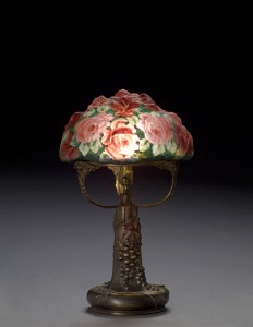 PAIRPOINT PUFFY ROSES LAMP This Pairpoint Puffy closed top 13-inch shade with large red roses and green leaves, supported on an original signed Pairpoint base with molded grapes and leaves, sold for : $9,775 (including the buyer’s premium) in February of 2007.
