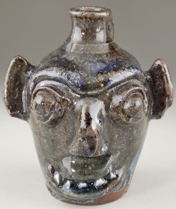 Lot 10 - pointy-toothed face jug