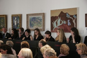 auction-interns-on-phones