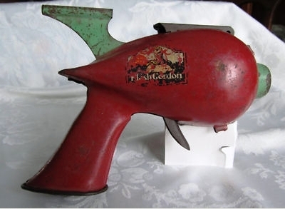 One of Max Teller's favorite Flash Gordon toys, a tin ray gun. www.salemhousepress.com
