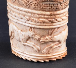 Carved-Bone-Cup-base,-notice-the-black-flecks