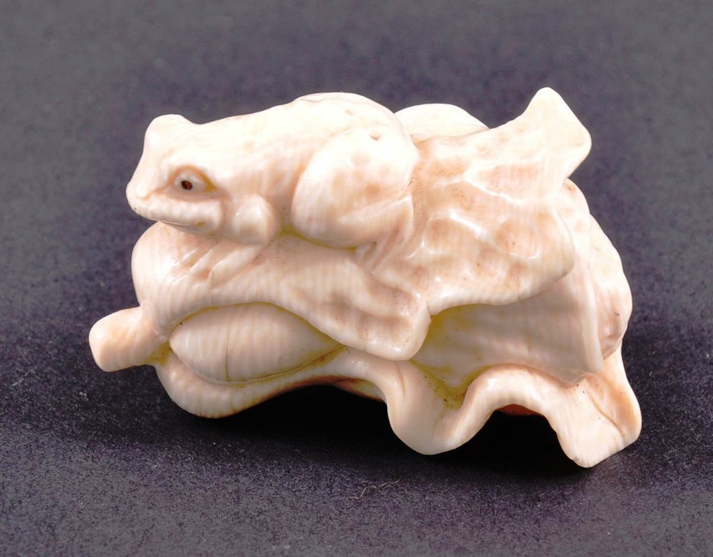 Carved-ivory-netsuke-of-a-frog-on-a-leaf