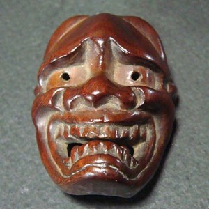 Wood_mask_netsuke_1870