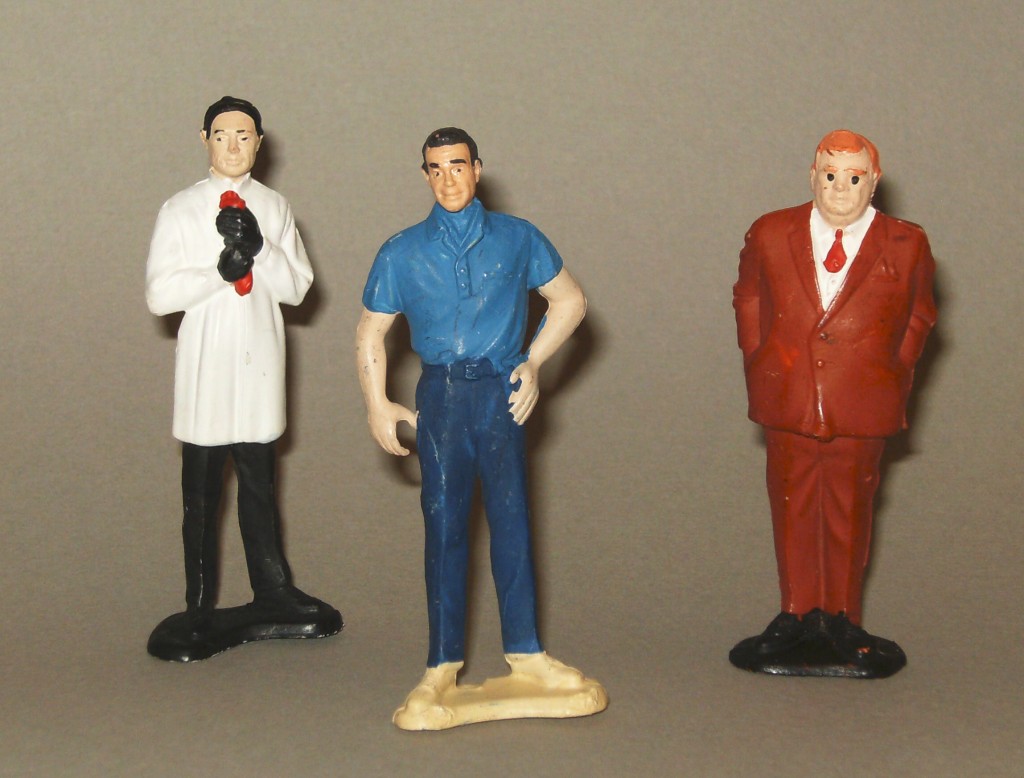 Dr. No, James Bond and Goldfinger 3 ½ inch tall figures released by A.C. Gilbert in 1965. Loose figures like these sell for ab