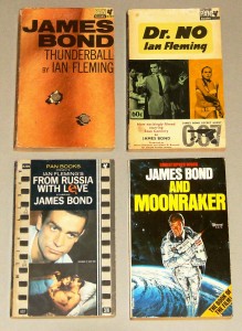 Various vintage James Bond paperback novels. Dr. No, From Russia With Love and Thunderball are Ian Flemming novels, while Moonr