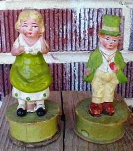 Even though these German papier mache candy containers are in quite poor condition, they are listed at nearly $300 due to their rarity