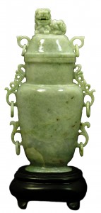 This 19th-century Chinese lavender jade covered vase, standing 10 ½ inches tall on a 2-inch base, should fetch between $2,000 and $3,000.