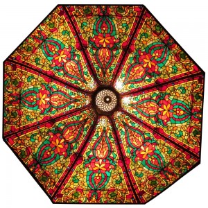 This large and beautiful 8-panel ceiling dome, made of leaded glass with the panels having serpentine form and measuring eight feet across, could realize between $10,000 and $15,000 at auction.