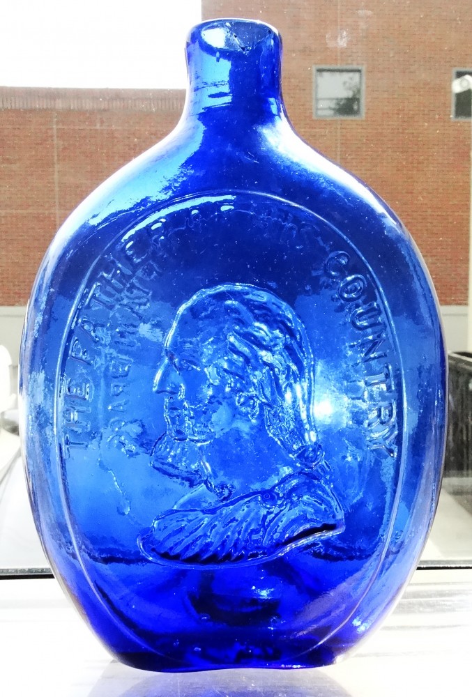 This George Washington/Zachary Taylor quart bottle (“The Father of His Country / A Little More Grape, Captain Bragg”), one of the finest examples known, is expected to sell for $5,000 to $10,000) in American Bottle Auctions’ next big online and catalog sale, scheduled to begin on July 11 and run through July 20.