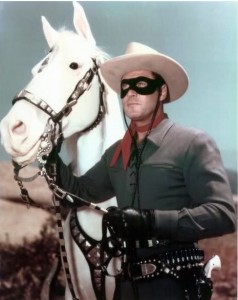 Clayton Moore as the Lone Ranger, with his horse Silver, from the television series.